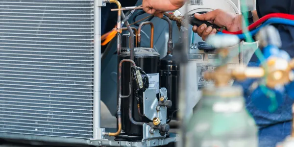 HVAC technician working on AC Repair