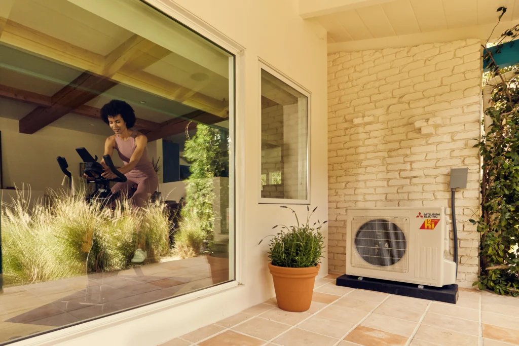 Mitsubishi Electric cold-climate heat pump outdoor unit installed at a Boulder home for Power Ahead Colorado rebate